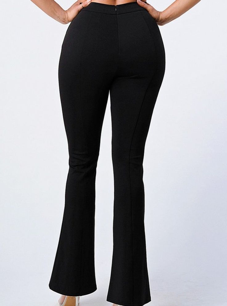 These trousers are the perfect black pants! These are a must have for your closet because they literally go with everything. The super soft scuba bodycon material pairs well with going-out tops, professional work tops, or even a hoodie for chill casual days. The flare bottom is on trend, looks great with heels or sneakers. Front seam detail. No pockets for a streamlined look. Zipper at back center. High waisted. Fabric Content: 95% Polyester, 5% Spandex Model is 5'8" and wearing size Small. The Flare, Going Out Tops, Flare Trousers, Work Tops, Black Media, Bell Bottom Jeans, Black Pants, Going Out, Trousers