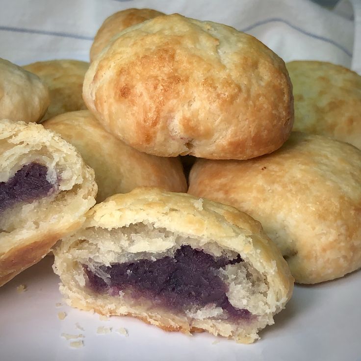 several pastries are stacked on top of each other in the shape of an egg roll