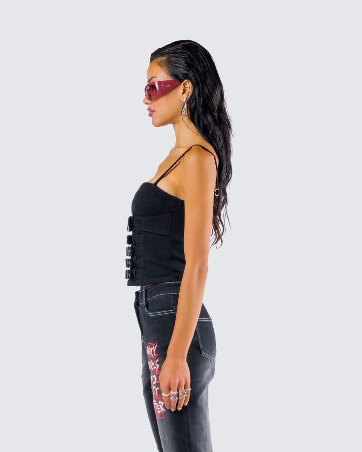 Buckle up, babe 🖤 Prepare for the ride of a lifetime in this black buckle top made from denim fabric for an edgy look perfect for all of our trouble makers 😈 Sleeveless Black Denim Top, Fitted Denim Top With Edgy Style, Edgy Fitted Denim Top, Black Denim Top For Summer, Edgy Cotton Crop Top For Night Out, Trendy Black Denim Top For Spring, Black Rebellious Streetwear Tops, Trendy Black Denim Top, Trendy Black Cotton Denim Top