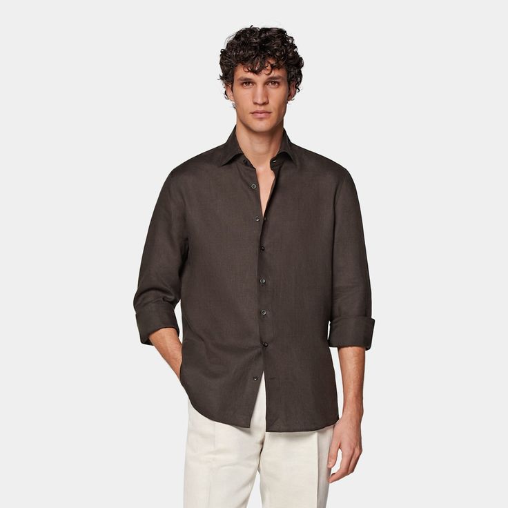 This breezy dark brown button-up shirt is tailored slim with soft collar interlining, a sleek French placket, and a slightly curved hem that makes it perfect for casually wearing untucked. Brown Relaxed Fit Shirt For Work, Formal Brown Button-up Shirt, Formal Brown Tops With Button Cuffs, Formal Brown Top With Button Cuffs, Brown Formal Top With Button Cuffs, Elegant Brown Business Tops, Elegant Brown Business Top, Formal Brown Top With Button Closure, Brown Spread Collar Tops For Work