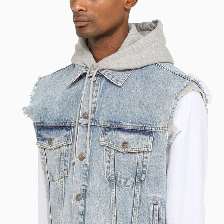 Gucci vest in blue denim with a button closure on the front, a Hollywood Babylon patch on the back, raw-cut edges, front pockets and an adjustable drawstring hood. Material: Denim. Size Type: ITSKU: 697042XDB0U This is a final sale clearance product. Our Products Are 100% Genuine. In All Cases We Stand By The Authenticity Of Every Product Sold On Our Site. Blue Gucci Cotton Outerwear, Gucci Cotton Outerwear For Spring, Gucci Spring Streetwear Outerwear, Gucci Outerwear With Pockets For Streetwear, Blue Cotton Gucci Outerwear, Gucci Cotton Outerwear For Fall, Gucci Cotton Outerwear With Pockets, Gucci Cotton Spring Outerwear, Gucci Blue Outerwear For Spring