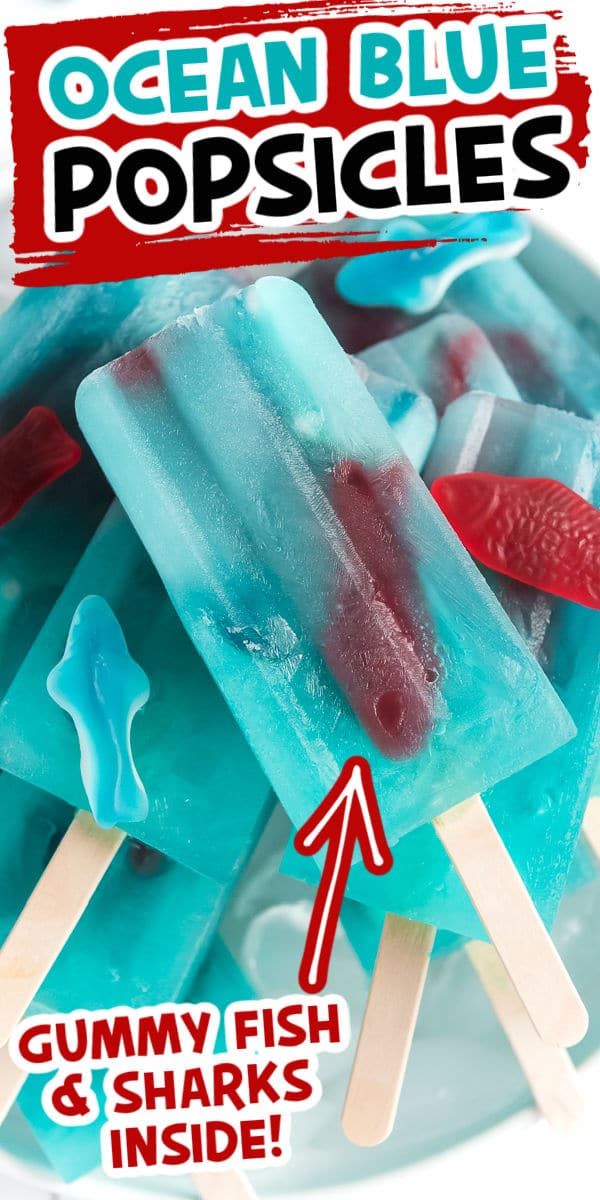 blue popsicles with gummy fish and sharks inside on a white background text reads ocean blue popsicles