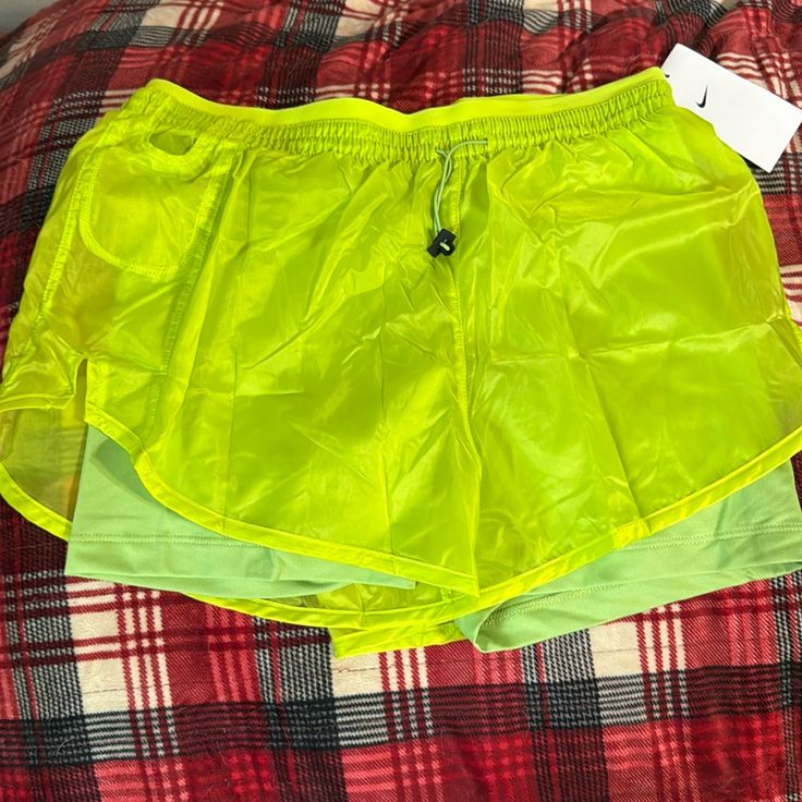 Nike Running Short Size Small. Drawstring Waist, Boy Short Built In. Zippered Pocket In Back. Nike Nylon Summer Shorts, Nike Nylon Beach Bottoms, Nike Summer Bottoms For Vacation, Nike Summer Vacation Shorts, Nike Summer Vacation Bottoms, Nike Stretch Shorts For Summer, Green Nike Shorts For The Beach, Trendy Nike Bottoms For Summer, Trendy Nike Summer Bottoms