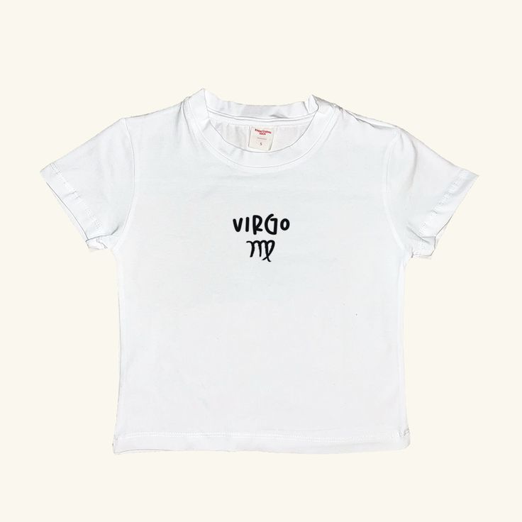 Elevate your summer wardrobe with our special collection of minimal and stylish Signs Baby Tees. This white tee, featuring the Virgo, offers a perfect blend of comfort and style, making it an essential piece for everyday outfits. It's minimal design and basic fit ensure it pairs effortlessly with any look. This unique collection celebrates the signs, making it a thoughtful gift or a personal treat. Don't miss out on the other designs in this collection! Visit our shop, Minel, to explore all the collections and find your perfect match. Material: 80% Cotton 20% Lycra Simple Summer T-shirt With Letter Print, Unisex Summer T-shirt With Logo Print, Unisex Logo Print T-shirt For Summer, Minimalist Short Sleeve T-shirt For Summer, White Minimalist T-shirt For Everyday, White Minimalist T-shirt For Spring, Unisex Summer Top With Logo Print, Minimalist Basic T-shirt For Summer, White Minimalist T-shirt For Summer