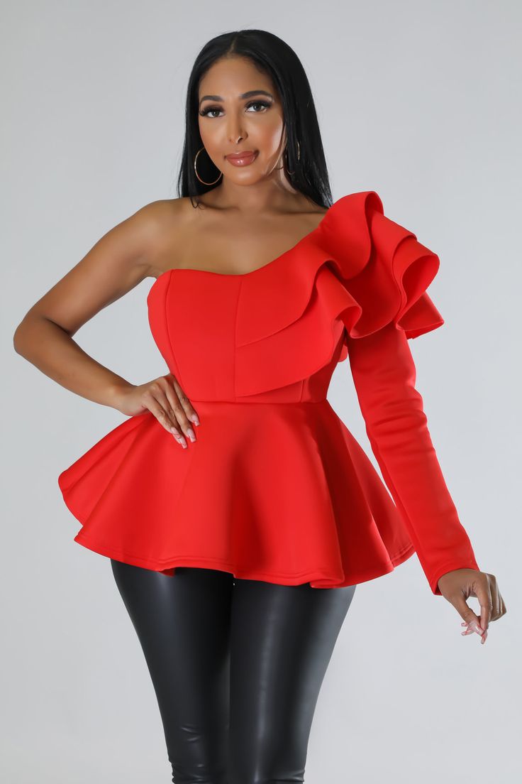 Show your sense of style with our red one-shoulder ruffle blouse. This feminine luxury item is designed to take you from office chic to night-out glam in just a few seconds. Adorned with trend-worthy shoulder detail, this blouse will make dressing up any day a pleasure. Long Sleeve One shoulder Solid color Scuba Fabric Ruffle Zipper on the side Luxury Ruffled Office Shirt, Elegant Luxury One-shoulder Cocktail Top, Luxury Stretch Blouse For Office, Luxury Chic Blouse With Ruffle Sleeves, Luxury One-shoulder Top For Formal Occasions, Luxury One-shoulder Women's Sets, Luxury Elegant One Shoulder Cocktail Top, Elegant Off-shoulder Top, Elegant Asymmetrical Top With Ruffles