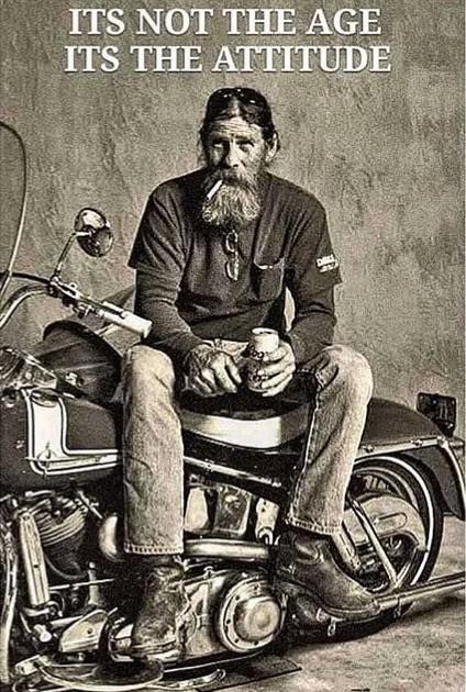 an old man sitting on top of a motorcycle with a beer in his hand and the caption it's not the age its the attitude