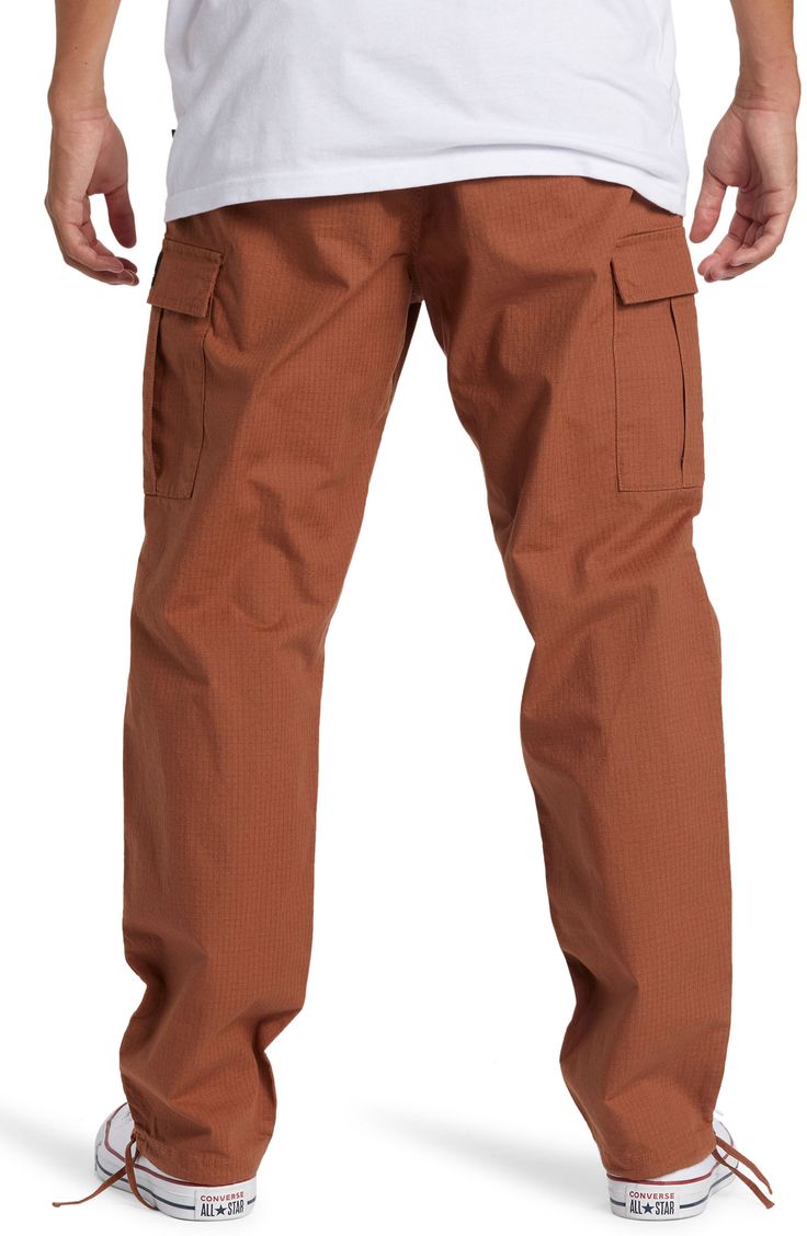 Cargo pockets amp up the versatility of these comfy everyday-staple pants crafted from durable organic cotton with a touch of stretch. Elastic waist Cargo flap-patch pockets 98% organic cotton, 2% elastane Machine wash, tumble dry Imported Cotton Parachute Pants With Pockets For Outdoor Activities, Outdoor Cotton Cargo Pants With Hip Pockets, Cotton Cargo Pants With Side Pockets For Outdoor Activities, Cotton Straight Leg Bottoms For Outdoor Activities, Long Pants Bottoms With Patch Pockets For Outdoor Activities, Brown Pants With Side Pockets For Outdoor Activities, Cotton Bottoms With Multiple Pockets And Tapered Leg, Everyday Brown Bottoms With Pockets, Cotton Parachute Pants With Multiple Pockets For Outdoor