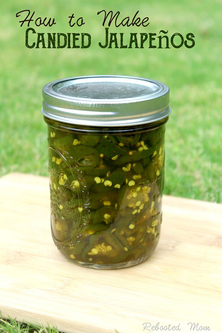 pickled jalapenos in a jar on a cutting board with the title how to make canned jalapenos