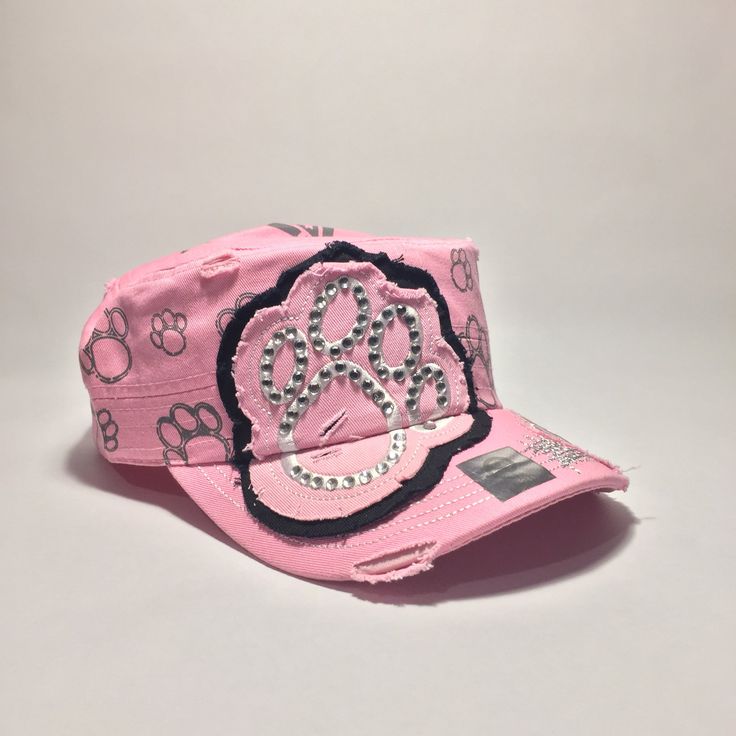 100% Cotton velcro back cap with rhinestones. Round curved visor vintage cap. One size fits most. Pink Trucker Hat With Curved Visor, Trendy Snapback Baseball Cap With Rhinestones, Trendy Pink Trucker Hat With Curved Visor, Trendy Rhinestone Snapback Baseball Cap, Pink Adjustable Curved Visor Hat, Casual Adjustable Baseball Cap With Rhinestones, Casual Cap With Rhinestones, Casual Rhinestone Cap, Pink Adjustable Baseball Cap With Curved Visor