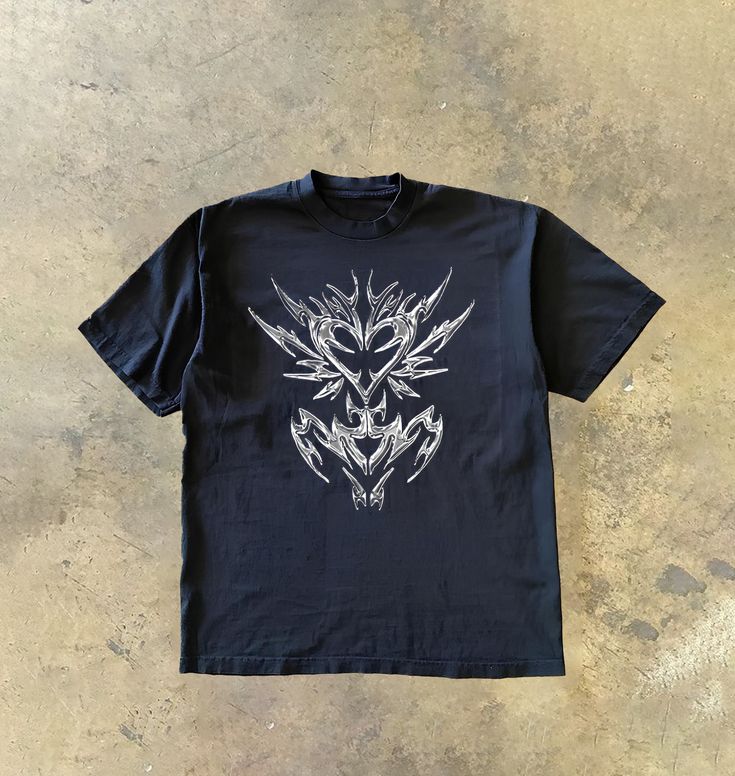 Elevate your streetwear game with our Cyber Sigilism Heart Shirt! This unique tee features a captivating heart logo inspired by cyber sigilism, perfect for those who embrace the fusion of technology and art. Whether you're a fan of Y2K vibes or crave futuristic fashion, this shirt is a must-have addition to your wardrobe. Express your style boldly and join the movement of cyber sigilism lovers. Upgrade your look today with a touch of digital mystique! Cybersigilism Shirt, Cybersigilism Clothes, Y2k Shirt Design, Cyberpunk Shirt, Futuristic Streetwear, Y2k Vibes, Upgrade Your Look, Heart T Shirt, Futuristic Fashion