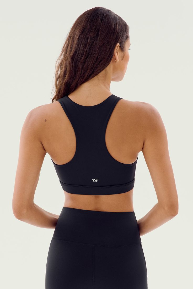 Hit the gym in our newest Rigor sports bra. A high neckline, wide racer back and longer length means support and coverage for your most vigorous workouts. BEST FOR: Running, court sports, spin class, cycling, gym workouts and other high impact workouts. Model Stats:Height: 5’10”, Bust: 32", Waist: 23.5”, Hips: 34.5”Wearing size: Small Fitted Sports Bra With Padded Back, Stretch Sports Bra With Padded Back For Gym, Fitted Yoga Sports Bra With Padded Back, Fitted Racerback Activewear With Padded Back, Sports Bra With Padded Back, Sports Stretch Bra With Padded Back, Fitted Padded Back Sports Bra For Workout, Padded Back Activewear For Yoga, Versatile Activewear With Mesh Racerback