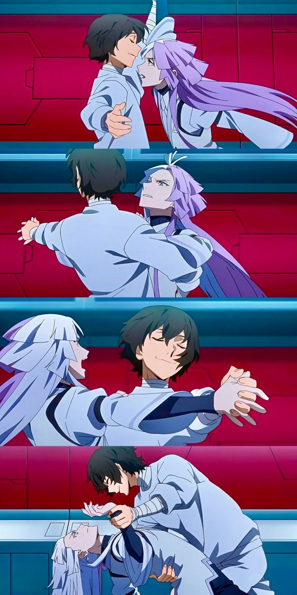 two anime characters hugging each other in front of red and blue stairs with their arms around one another