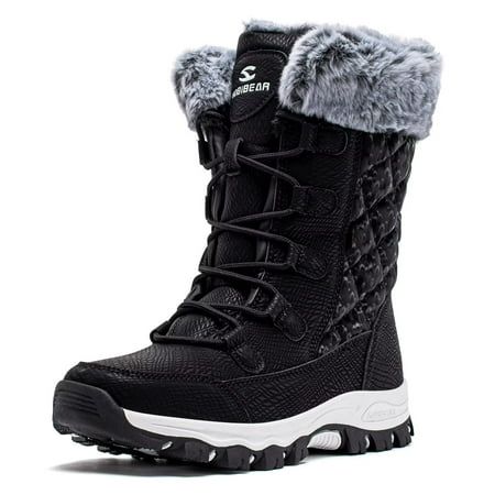 a pair of black and white snow boots