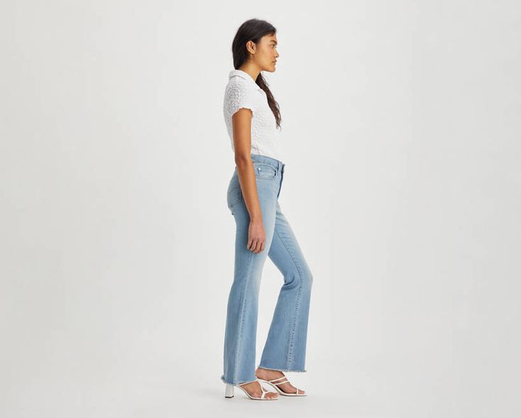 Our 726 High-Rise Flares are designed with a slim fit through your hip and thigh before flaring at the knee. Part of our signature ‘Lot 700’ fits, these jeans are designed to flatter;all day, every day. For those days when skinny jeans won't do Features a high rise Finished with a flared leg Authentic denim character enhanced with supersoft stretch. For jeans that'll leave you starry-eyed. That's Levi's® Stellar Stretch. Thanks to excellent built-in recovery, they champion your curves and move w Fitted Medium Wash Summer Flares, Fitted Medium Wash Flares For Summer, Summer Fitted Medium Wash Flares, Summer Denim Fitted Flares, Levi's High Rise Relaxed Fit Flare Jeans, Fitted Flare Jeans With Five Pockets, Fitted Medium Wash Flares For Spring, Levi's High Rise Slim Fit Jeans, Fitted Mid-rise Denim Flares