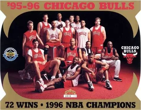 the chicago bulls basketball team is posing for a photo in front of an official poster