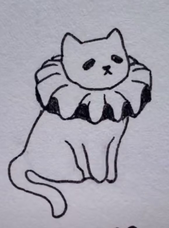 a drawing of a cat sitting on top of a white paper with a black outline