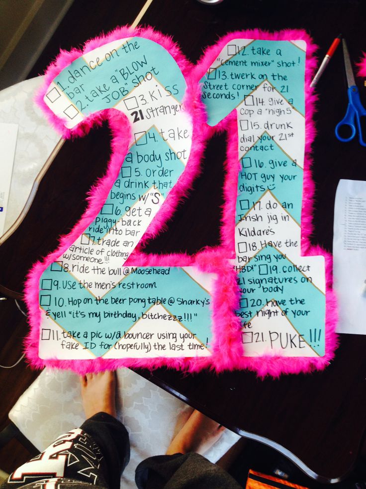 the number twenty two is made out of pink and blue paper with writing on it