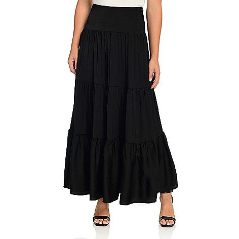 Let this long flowy skirt from Elan define your outfit! With a beautiful  flowy triple tier style and a smocked waist on the back  this maxi is not only a statement-maker  but a comfortable choice as well! The extra wide front waistband defines your figure and cascades down towards the three gauzy tiers below. Dress it up or keep it casual  the choice is yours with this skirt's neutral colors! Long Flowy Skirt, Tiered Maxi Skirt, Skirt Fits, Flowy Skirt, Skirt Length, Neutral Colors, Maxi Skirt, Midi Skirt, On Sale