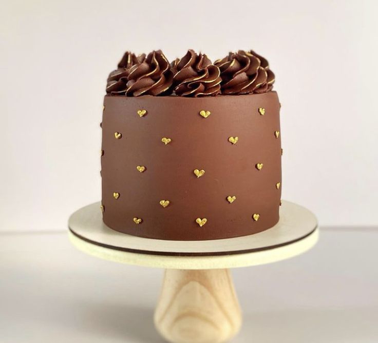 there is a chocolate cake with hearts on it