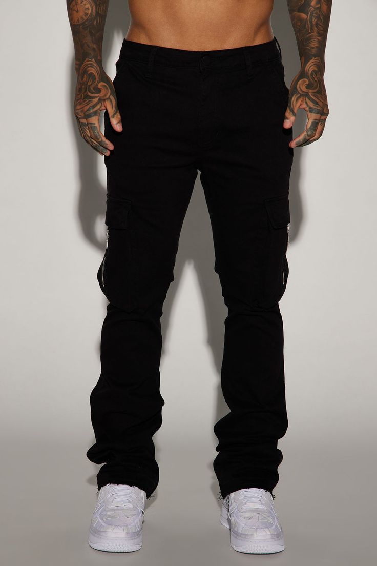 Available In Black. Stacked Skinny Flare Fit Button Closure Zip Fly Side Pockets Back Pockets Cargo Pockets With Zipper Detail Open Hem 98% Cotton 2% Spandex Imported | Mens Affection Stacked Skinny Flare Cargo Pants in Black size 30 by Fashion Nova Slim Fit Bottoms With Pockets For Streetwear, Black Stretch Cargo Pants With Tapered Leg, Slim Fit Straight Leg Bottoms For Streetwear, Slim Fit Streetwear Pants With Pockets, Slim Fit Pants With Pockets For Streetwear, Slim Fit Mid-rise Pants With Pockets, Mid-rise Slim Fit Pants With Pockets, Black Cotton Pants With Button Closure, Black Cotton Bottoms With Button Closure