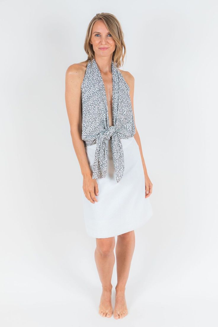 Elegant Multi-way Tops For Summer, Chic Beach Tops With Tie Neck, Chic Beach Top With Tie Neck, Chic Tie Neck Beach Tops, Chic Tie Neck Tops For The Beach, Elegant Blue Halter Top For Beach, Chic Multi-way Summer Tops, Chic Halter Top For Beach Season, Chic Multi-way Tops For Summer