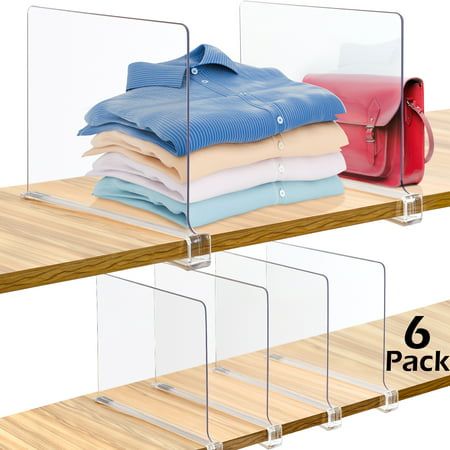 three clear acrylic shelves with folded shirts on them