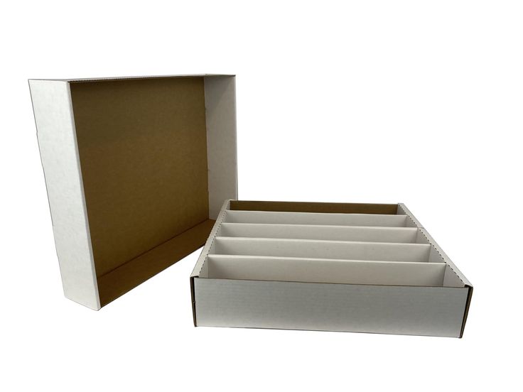 PRICES MAY VARY. Each Box Holds approximately 5,000 20pt trading cards or approximately 7,000 gaming cards Premium Quality - Easy to assemble Works great for a shipping box as well! Interior Dimensions (WxHxD): 17 5/8 x 15 1/8 x 3 3/4 Row Width 2 3/4 Exterior Dimensions (WxHxD): 19 x 15 5/8 x 4 Made in the USA! *Does not include cards The Max Protection Storage Box is the highest quality cardboard storage box on the market today. They are constructed of white corrugated paper and have a 200 lb. Cardboard Storage Boxes, Card Organization, Trading Card Storage Boxes, Gaming Cards, Memorabilia Display, Trading Card Storage, Cardboard Storage, Corrugated Paper, Interior Dimensions