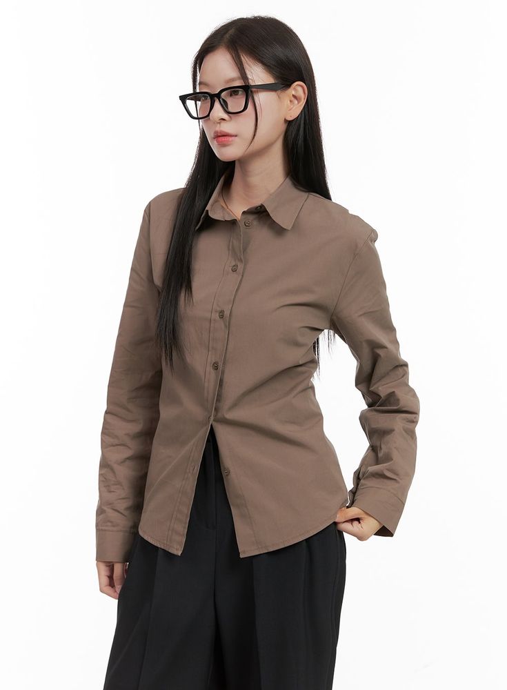 Product Detail Style : Casual, Minimal Occasion : Work wear Detail : Buttoned, Strap Print : Solid Material : Cotton Sleeve : Long sleeve Neck : Collar Cotton100 Color : Brown, White, Black Made in Korea Model Size Model is wearing size S/M and the color Brown. Height : 5'5" | 165cm / Top : S / Bottom : S (26 inch) .prddescription table, .prddescription td, .prddescription th { border : 1px solid black; border-collapse : collapse; padding: 10px; } Size(Inch) Size Shoulder Bust Sleeve Length Armh Brown Long Sleeve Office Top, Cotton Office Wear Blouse, Casual Long Sleeve Slim Fit Blouse, Brown Cotton Blouse For Work, Casual Slim Fit Blouse For Business Casual, Casual Brown Top For Office, Brown Cotton Workwear Blouse, Casual Brown Office Top, Solid Cotton Tops For Office Wear