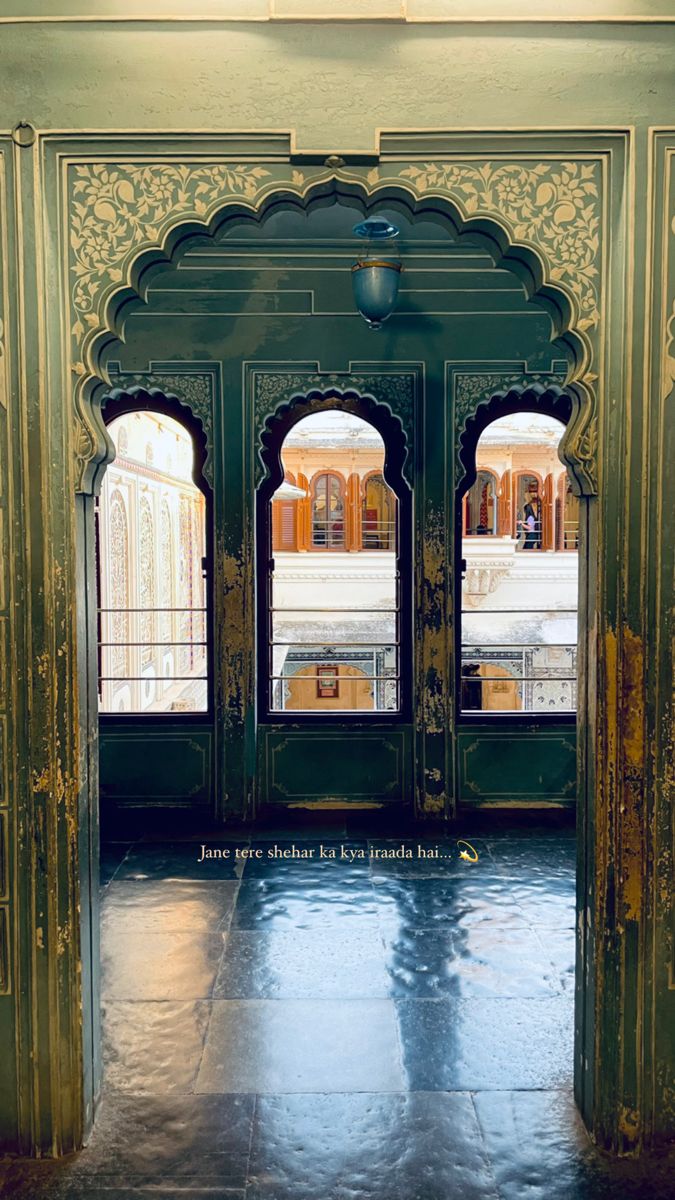 an ornate doorway leading into a building