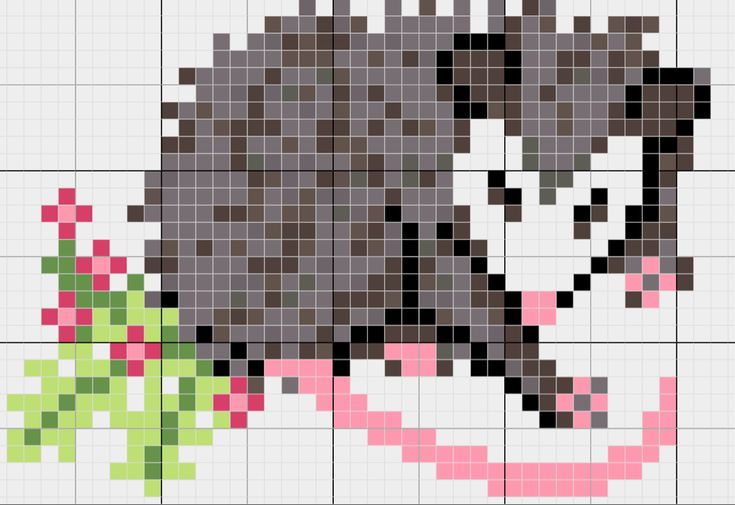 a cross stitch pattern of a cow with flowers