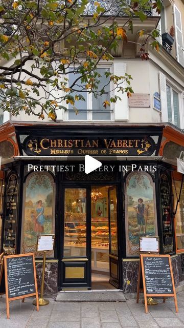 an outside view of a store with signs on the front and side of it that say,