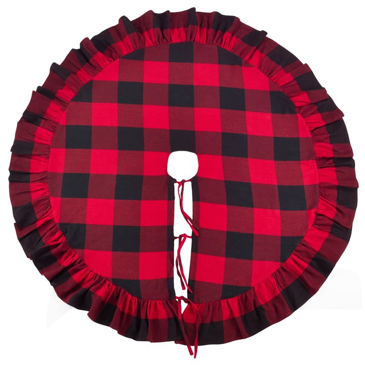 a red and black buffalo plaid pillow with ruffles on the bottom, in front of a white background