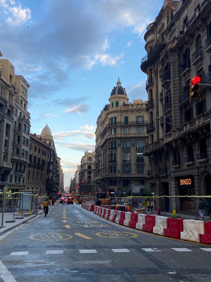 an empty city street with buildings on both sides