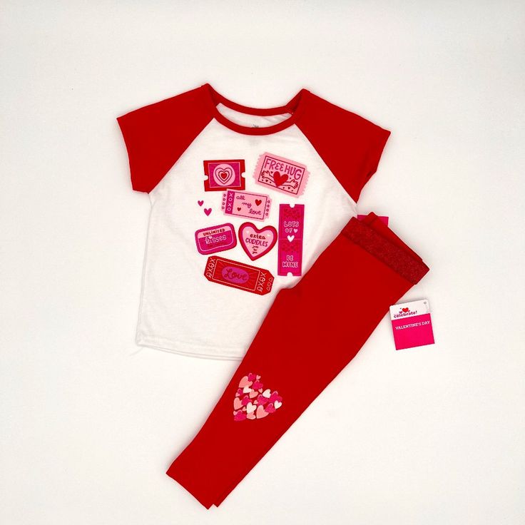 Brand New With Tags! 2 Piece Way To Celebrate! Ticket To My Heart Girl Legging And T-Shirt Set. White T-Shirt With Red Arms And Collar Covered In Valentine Themed Ticket Stubs. "Free Hugs" "All My Love" "Lots Of Love" "Be Mine" "Unlimited Kisses For Mommy" "Extra Cuddles Just For You" Vibrant Red Girl Leggings. Both Knees Are Covered In A Mixture Of Mini Hearts In White And Pinks. The Waist Band Is Metallic And Glittery. Size: 18 Months Height: 30 - 31.5" Weight: 22.5 - 26lbs T-Shirt Materials: Cute Red Playwear Sets, Playful Red Fitted Sets, Playful Red Fitted Set, Playful Fitted Red Sets, Pink Cotton Play Sets, Fitted Red Playwear Sets, Toddler Boy Hoodie, Girl Leggings, Red Girl