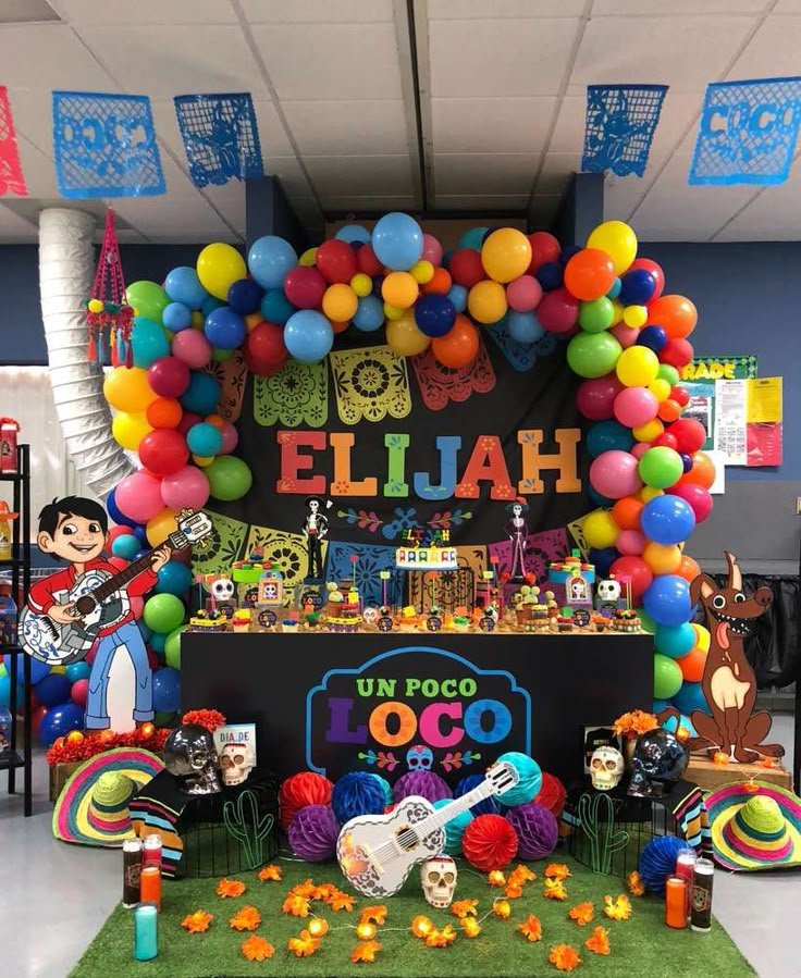 a birthday party with balloons and decorations