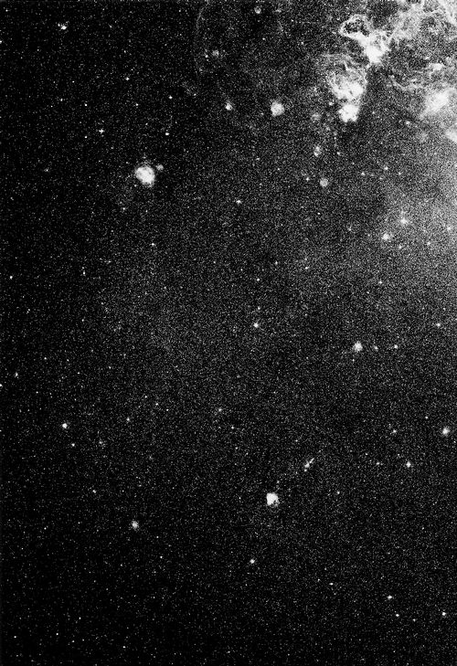 black and white photograph of stars in the night sky