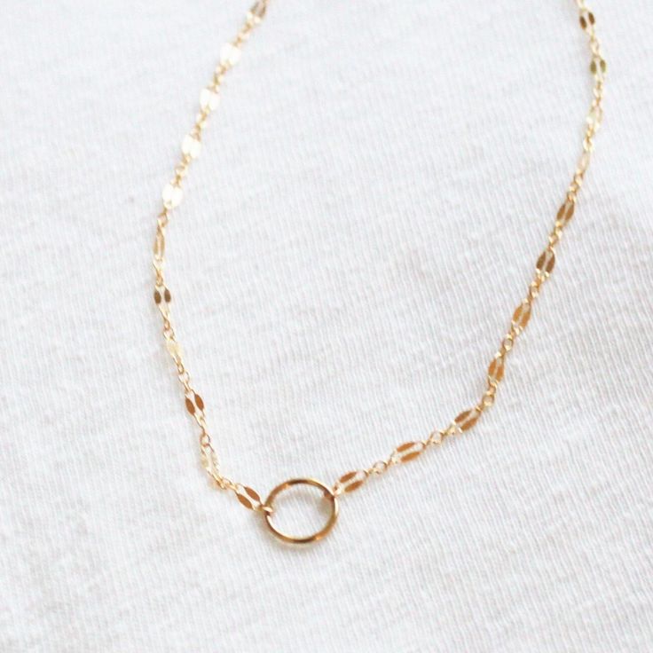 One of our best selling dainty necklaces! This mini eternity necklace is edgy and chic, wear it in gold or silver. A reminder that some things do last forever! -10mm open circle -14kt Gold-Filled or sterling silver chain & circle. -Choose fancy, link, drawn, satellite or bar link chain -Water Friendly Everyday Circular Cable Chain Necklace, Everyday Charm Necklace With Round Pendant And Delicate Chain, Simple 14k Gold Filled Charm Necklace With Delicate Chain, Simple 14k Gold-filled Charm Necklace With Delicate Chain, Circle Jewelry With Adjustable Chain For Everyday, Everyday Round Charm Necklace With Cable Chain, Minimalist 14k Gold Filled Round Pendant Jewelry, Dainty Clavicle Chain With Open Circle Pendant, Everyday Delicate Infinity Chain Necklace