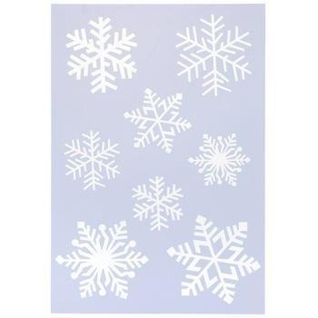 white snowflakes are arranged on a light blue background, with the shape of four different snowflakes