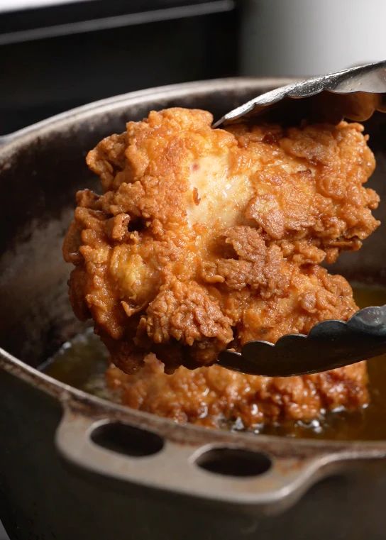 a close up of a spoon with food in it