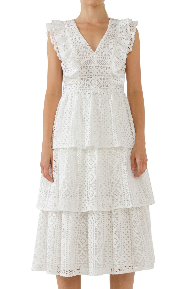 Frilly ruffles on lace define this breezy midi dress with a tiered skirt that serves up major boho energy. V-neck Cap sleeves Lined 100% polyester Hand wash, dry flat Imported Rose Lace, Tiered Midi Dress, Lace Ruffle, White Midi Dress, Tiered Skirt, Nordstrom Dresses, Cap Sleeves, Ruffles, White Dress