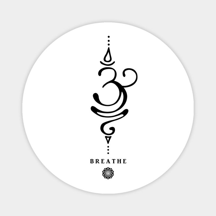 a white circular sticker with the word breathe in black ink on it's side