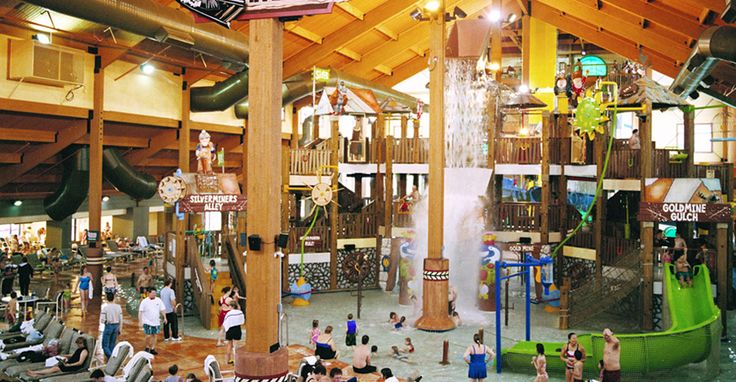 an indoor water park with lots of people