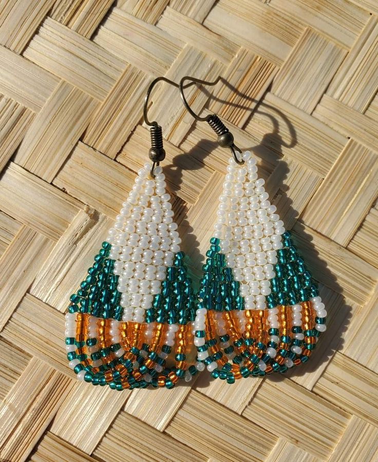 Beautiful alaska native beaded earrings made with hypoallergenic earring hooks for sensitive ears. Southwestern Green Earrings With Colorful Beads, Southwestern Style Green Earrings With Colorful Beads, Southwestern Green Earrings With Dangling Beads, Handmade Southwestern Green Beaded Earrings, Southwestern Green Beaded Dangle Earrings, Southwestern Green Beaded Dangling Earrings, Green Southwestern Beaded Earrings Gift, Southwestern Green Beaded Earrings For Gift, Green Southwestern Beaded Earrings For Gift