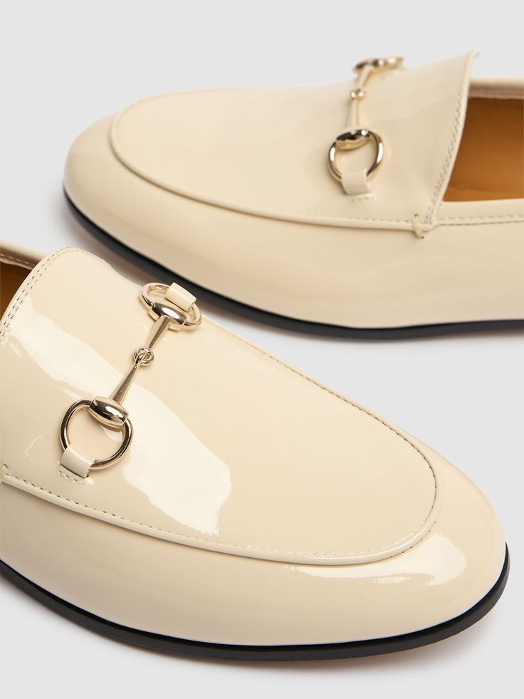 White patent leather . Light gold-toned hardware . Horsebit. Leather sole Gucci Jordaan, Versace Brand, Ski Accessories, Sports Accessories, Flat Espadrilles, Swim Accessories, Heeled Loafers, Ski Wear, Leather Loafers