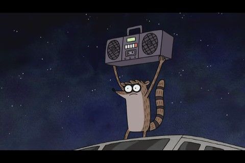 a racoon is holding up a boombox in the air with its head