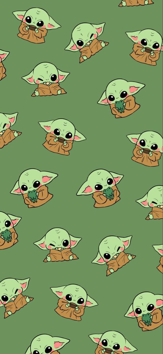 the baby yoda is eating something with it's hands and eyes, as if he