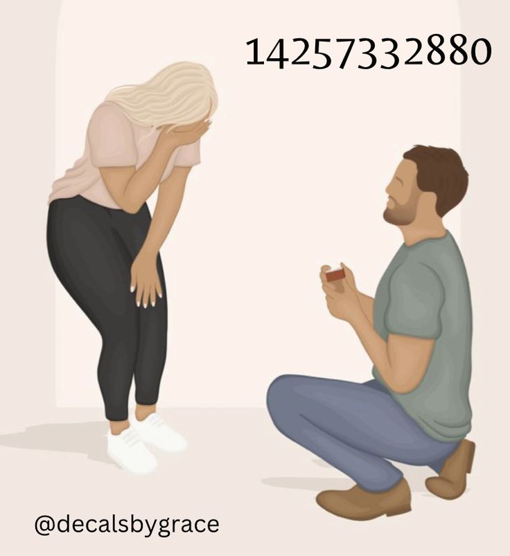 a man kneeling down next to a woman