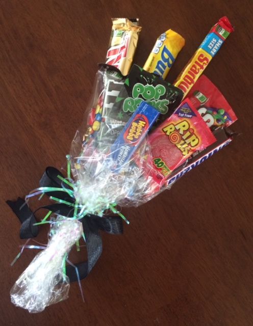 a bouquet of candy and candies on a table