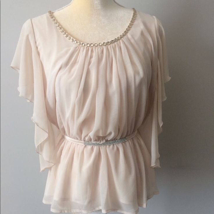 Black Collection Pale Pink Dressy Blouse. Decorated With Pretty Stones On Neckline & Waist Belt With Stones. Measurements: Shoulder To Hem: 26’ Shoulder To Waist: 17’ Armpit To Armpit: 19’ Elegant Flowy Tops For Party, Flowy Elegant Party Tops, Elegant Flowy Tops For Night Out, Elegant Flowy Evening Tops, Flowy Short Sleeve Blouse For Party, Dressy Blouse, Tops Black, Pink Blouse, Waist Belt