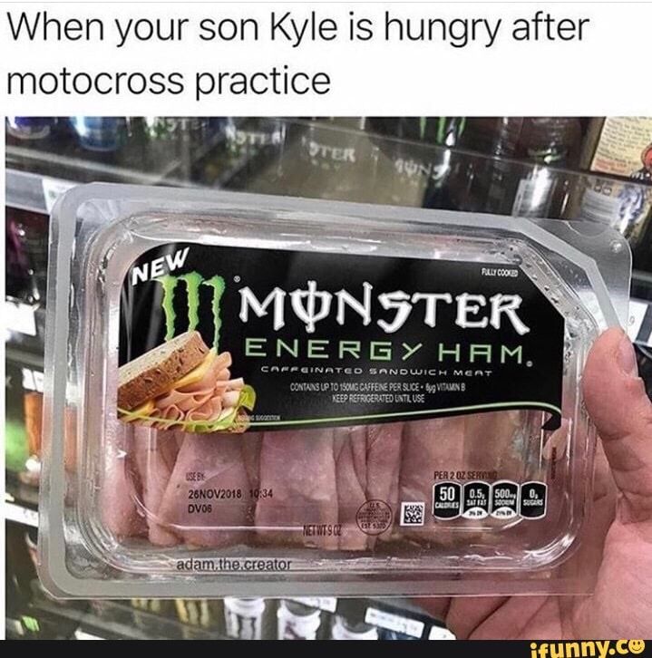 a person holding up a packaged package of meat in front of the store display case